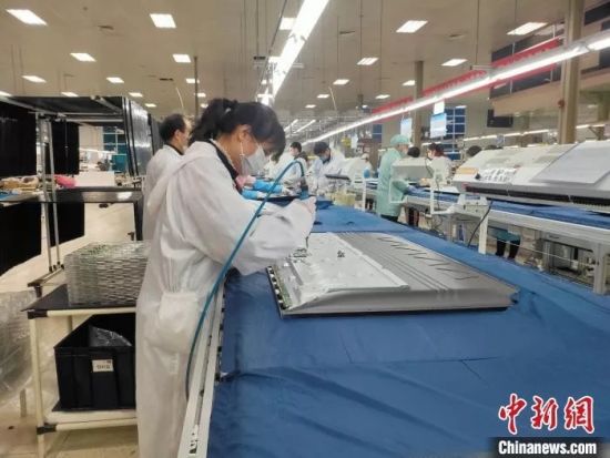 资料图：工厂复工。（图源：中新网）