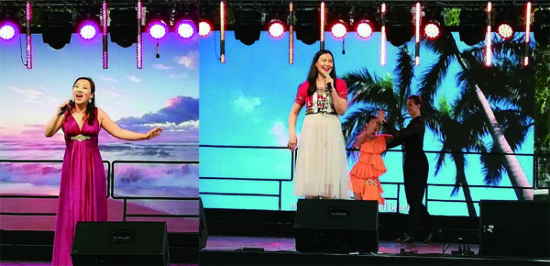 来自维也纳丝路秀艺术团歌唱演员黄琳在中国旅游文化周开幕式上表演了《渔家姑娘在海边》等海南歌曲。匈牙利拉丁舞演员SZUCS